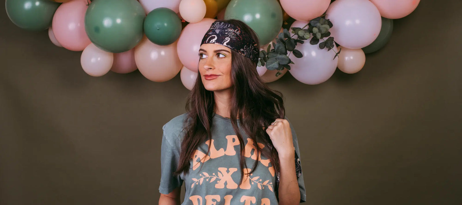 Girl wears a gray bohemian style tshirt