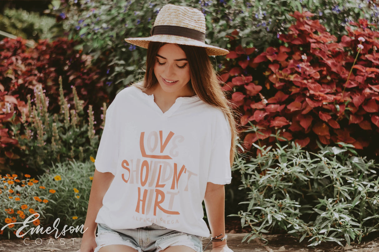 Alpha Chi Omega Love Shouldn't Hurt Notch Tee
