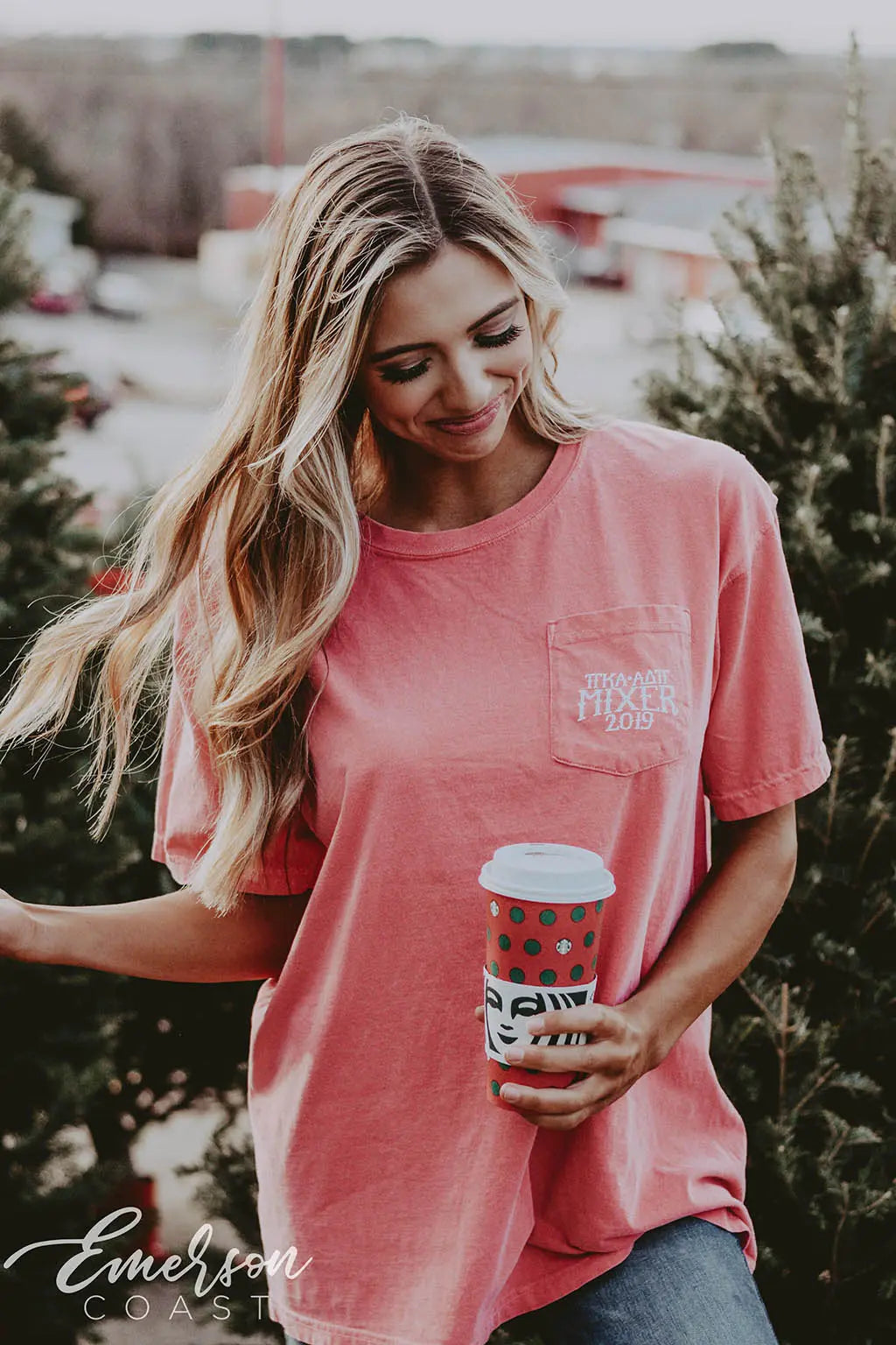Girl wears a red shirt with Pike and ADPi letters on the left pocket.